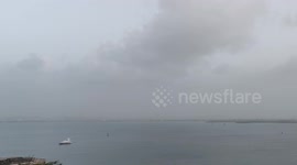 Sunset covered by the Saharan Dust Plume over San Juan Bay, San Juan, Puerto Rico, Caribbean