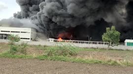 Black smoke seen billowing into the air as fire erupts at factory in west India