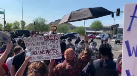 Phoenix police fire pepper balls at crowd demonstrating outside Trump rally