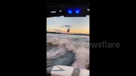 Man is sent flying when trying to perform backflip on a jet ski in Alaska