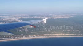 Arriving in Lisbon by air, view from inside the aircraft.