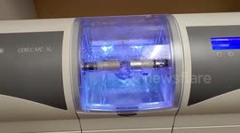 This machine creates dental crowns in a matter of hours while patients wait