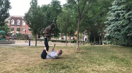 Talented pooch can hold his balance on owner's feet