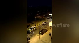 Shocking footage shows London police officers fleeing a park chased by an angry mob throwing bottles after a street party got out of hand