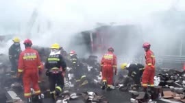 Truck carrying 20,000 iPhones goes up in flames after highway crash in China