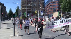 Dozens of climate protesters block traffic in UK on hottest day of the year