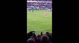 Derby County fan hitting Nottingham Forest's Kelvin Wilson