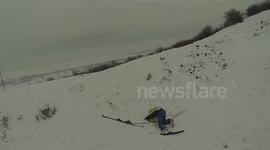 Romania skier faceplants a snow drift