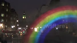 London's Night Sky Lit Up By Rainbow