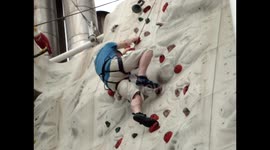 Me climbing wall