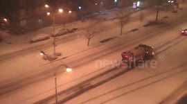 Snow ploughs clearing heavy snowfall in New York City