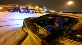 Car drifts in NYC snow