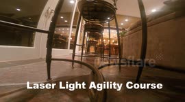 Cat a Laser Light Through Chairs