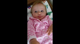 Cute Baby blowing raspberries