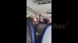 Moment US airline pilot told passengers he was locked out of cockpit