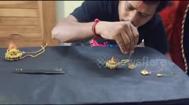 Indian miniaturist carves millimetres-tall wooden sculpture of chariot