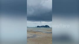 Waterspout forms after storm along coast of southern Thailand