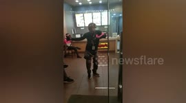 Delivery rider dances to pass the time while waiting for orders
