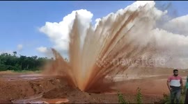 Pipeline breaks and forms spectacular water fountain on highway in India