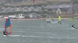 Large gathering of windsurfers enjoy the sports as lockdown easies in UK