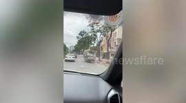Motorcycle rider carries huge pile of trash in Vietnam