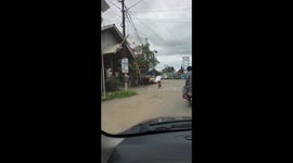 Grandma rolling on bmx bike.