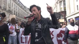 Jolyon Rubinstein leads chant of