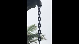 Rain water running down a rain chain