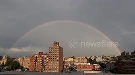 On Pride Day, an impressive double rainbow is seen over New York City skyline