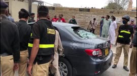 Video of car used by gunmen outside Pakistan stock exchange building in Karachi