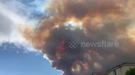 Smoke column from Mahogany fire blots out the sun in Nevada