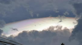Beautiful rainbow cloud appears after storm in the Philippines
