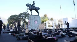 Dozens protest gender-based violence outside South Africa's Parliament
