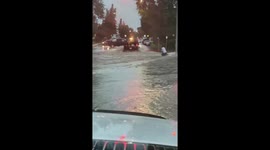 Man seen 'surfing' in flooded waters in Manitoba after storm