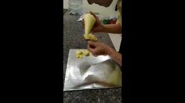 Vietnamese baker creates dragon and phoenix from whipped cream