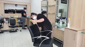 London hairdresser prepares to reopen after lockdown