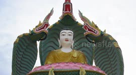 Myanmar snake temple with 'holy' pythons sees thousands of pilgrims every year