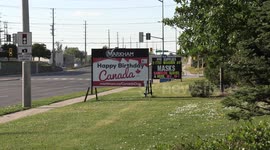 Signs of the times this Canada day near Toronto during the COVID 19 coronavirus pandemic as all events and celebrations remain cancelled