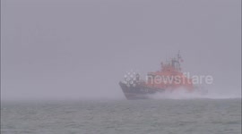 Sheerness All Weather Lifeboat at speed in rain/fog