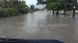 Drivers battle through flash floods in eastern Thailand