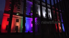 Pride flag made out of colorful floodlights illuminates building in Toronto