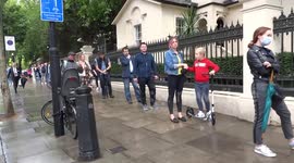 Russian citizens in London queue to get inside embassy for constitution vote
