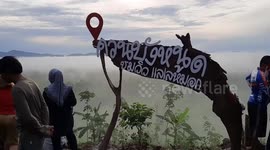 Beautiful sea of mist rises over mountains in southern Thailand