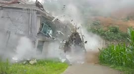 Houses collapse in central China due to landslide