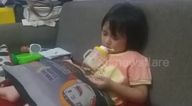 funny behavior 3 year olds fall asleep while drinking milk using a bottle