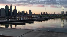 MANHATTAN SKYLINE FROM BROOKLYN WATERFRONT AT SUNSET. NEW YORK CITY. May 8, 2020