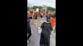 Moods immediately change when Minnesota police show up in riot gear for Isak Aden's peaceful march