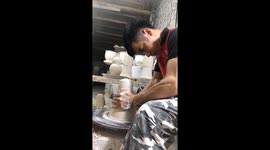 Vietnamese potter uses his hands and clay to create impressive vase