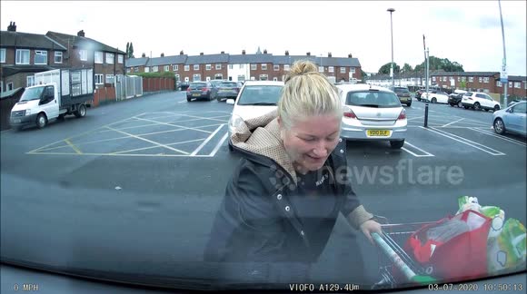 'Can I help you love?' Hilarious moment UK woman starts putting shopping into wrong car