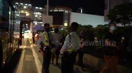 Long queue of passengers without social distancing during rush hour